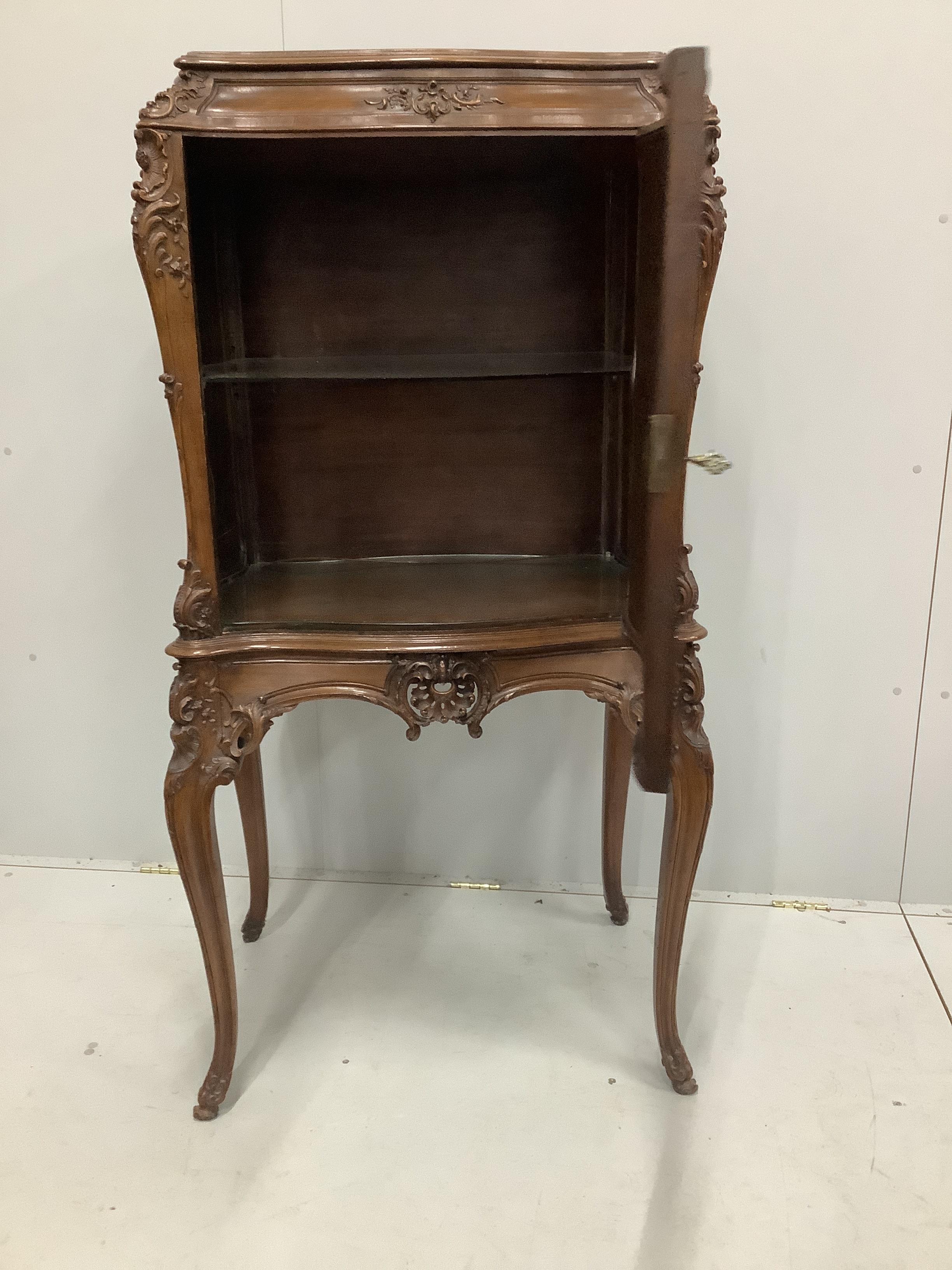 An early 20th century French mahogany side cabinet, width 74cm, depth 51cm, height 150cm
